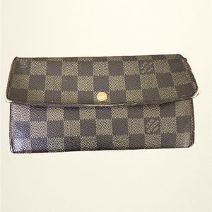 Louis Vuitton long wallet.